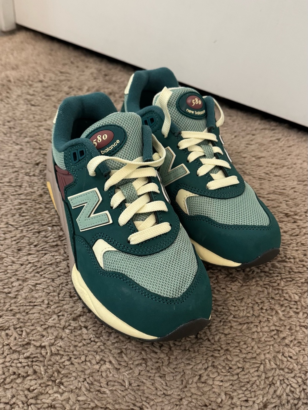 LIKE NEW teal New Balance 980’s